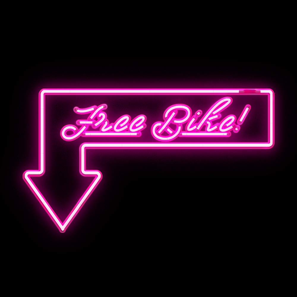 a neon light that reads 'free bike'