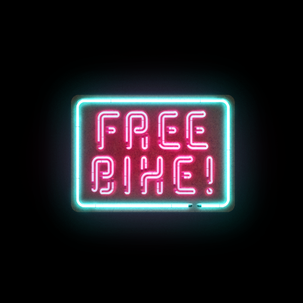 a neon light that reads 'free bike'