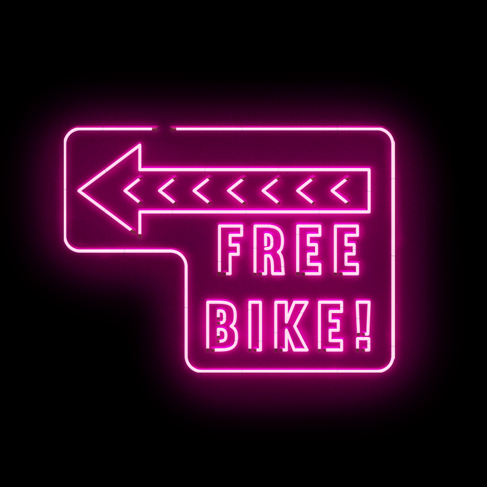 a neon light that reads 'free bike'